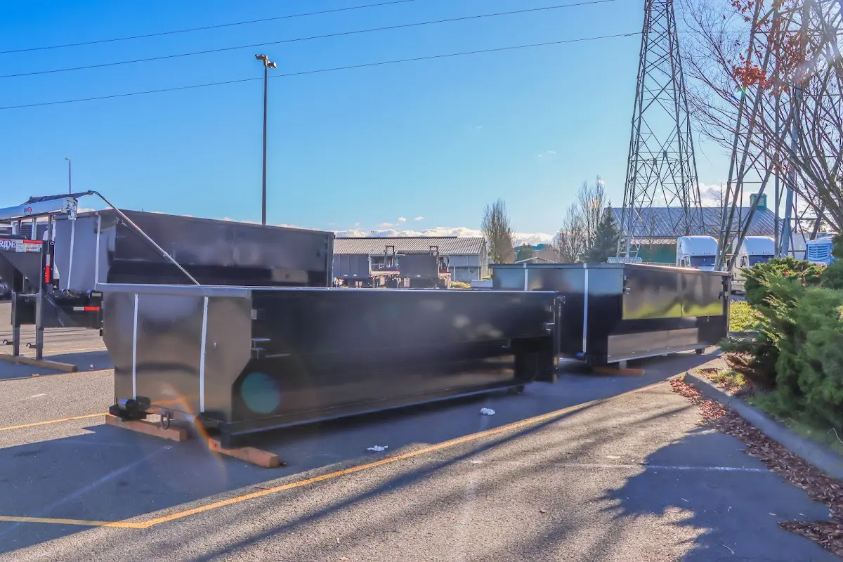 Roll-off dumpster ready for waste disposal at job site for Commercial Dumpster Rental in Woodland